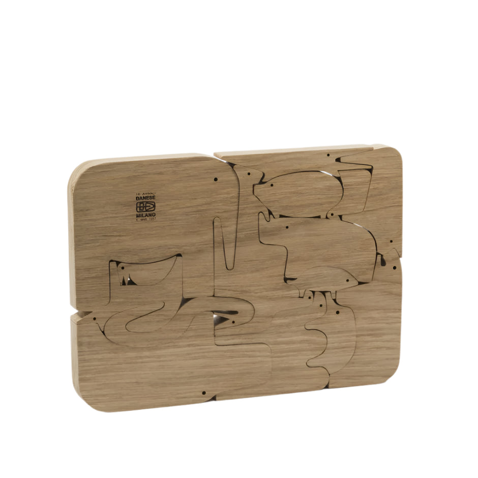 Wooden cutting board with animal cutouts on a white background