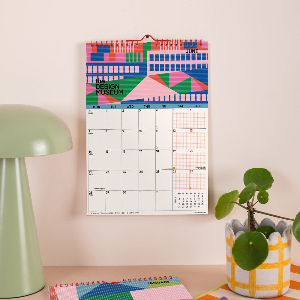 Bold colourful Design Museum calendar on a white wall