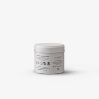 A white plastic jar of natural vegetable wax with a matching white lid, shown from the back against a clean white background.