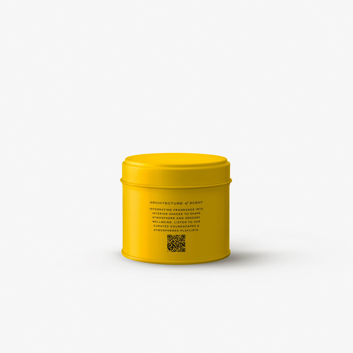 Yellow candle tin on a grey background