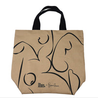 Beige tote bag with black abstract designs on a white background