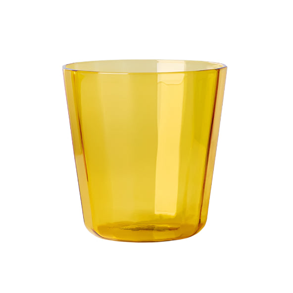 hexadecagon textured shaped tumbler glass cup on yellow amber colour, one by itself pictured on white background