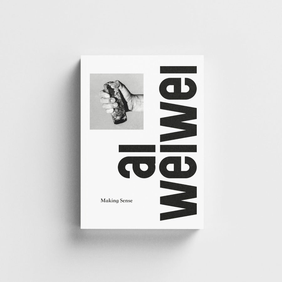 Ai WeiWei catalogue front cover with a black and white photo and black bold text on a light gray background