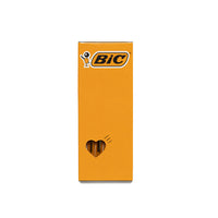 Orange box of BIC biros on a white background