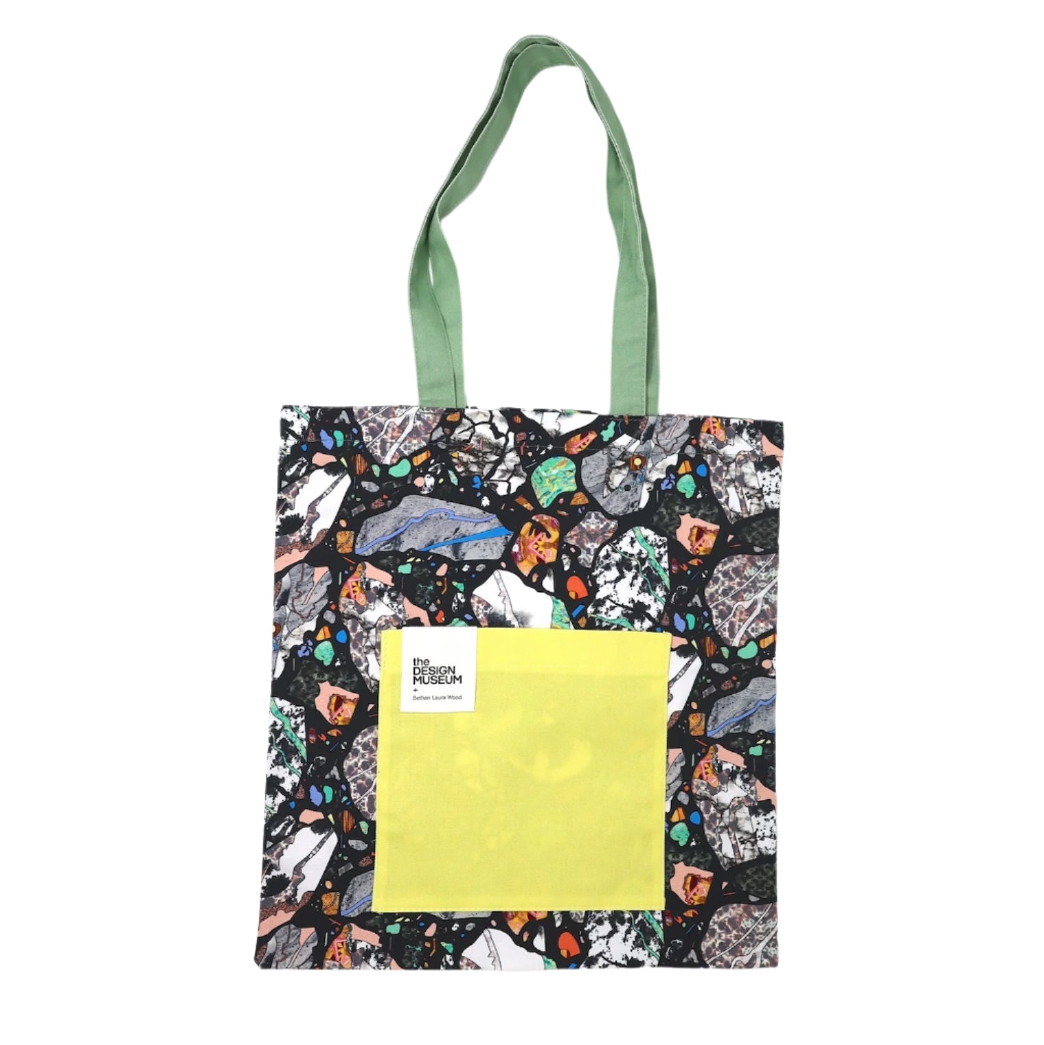 Tote bag with colorful pattern and green handle on a white background