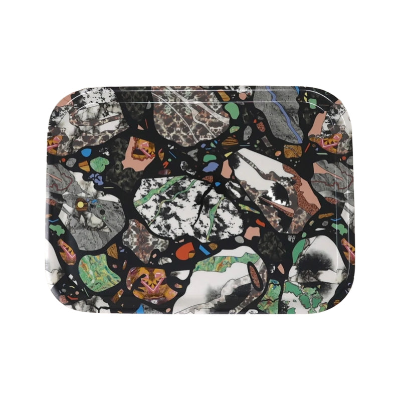 A colourful abstract marbled patterned tray on a white background