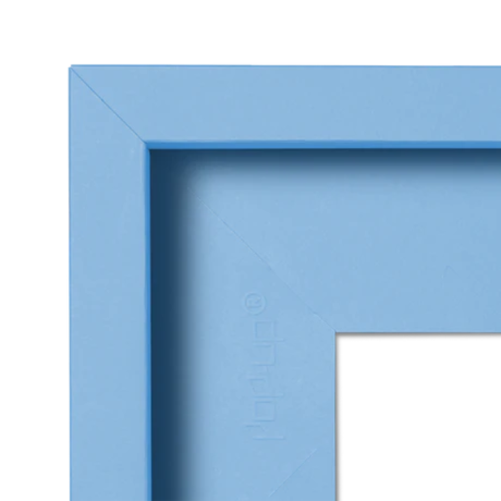 Close-up of a light blue picture frame corner with 'pop-up' branding.