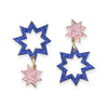 Pair of star-shaped earrings with blue and pink glittery finish on a white background