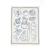 Tea towel with line drawings of food items on a white background