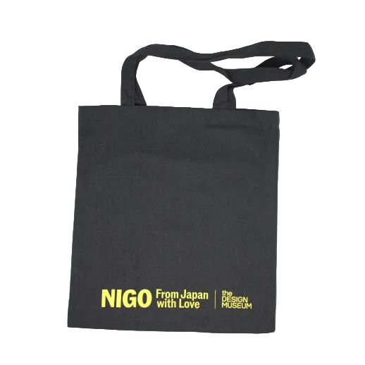 Black tote bag with yellow text on a white background