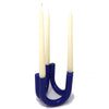 blue candle holder with candles.