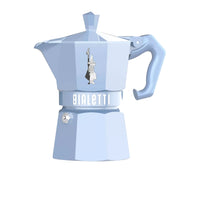 Light blue Bialetti coffee maker on a light gray background