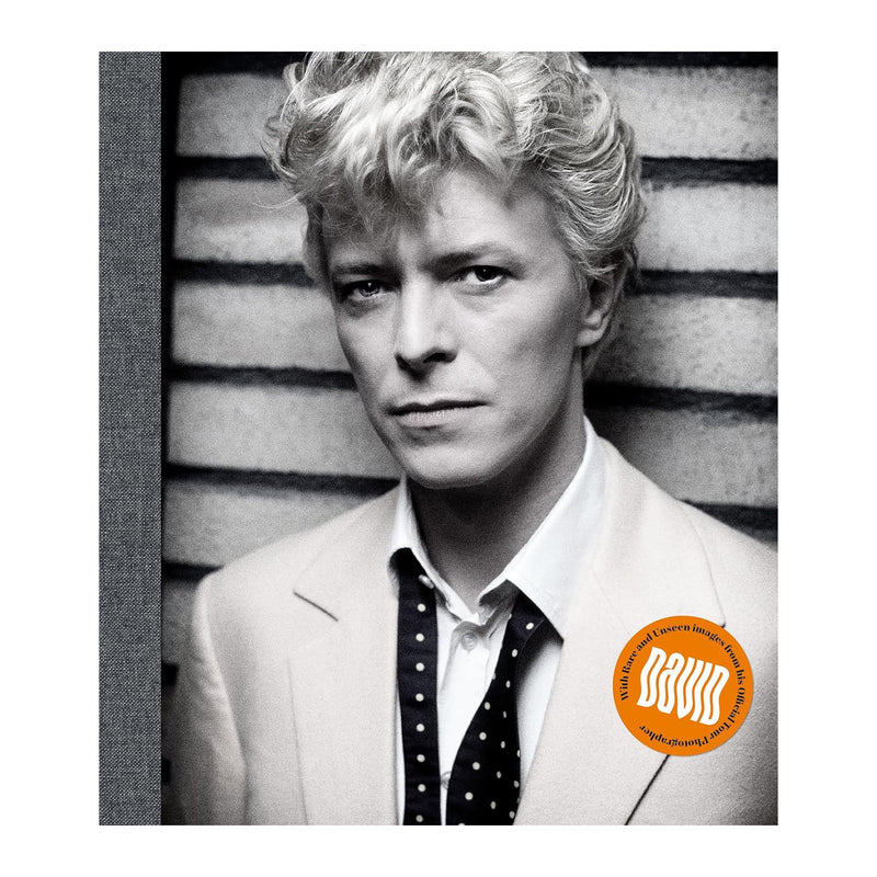 Black and white portrait of a person with a music album cover logo in the corner.