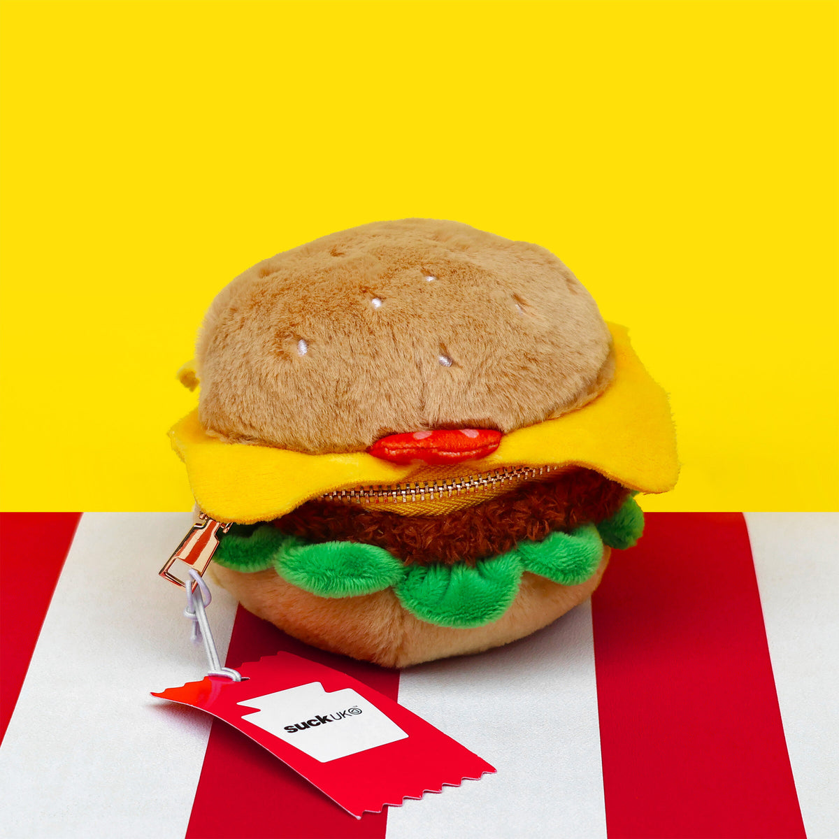 Felt burger shaped zip up pouch on a red and yellow background