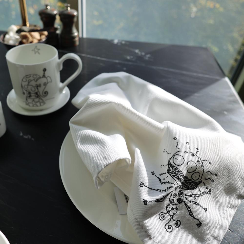 Tim burton illustrated napkin on a kitchen table