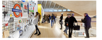 People exploring a modern store interior with a prominent Underground sign.