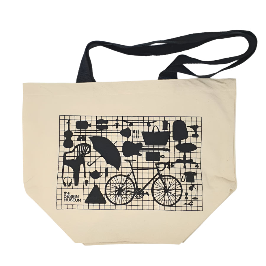 picture of an off white tote bag with black handle featuring a monochromic printed image of the crowdsourced wall of the design museum.
