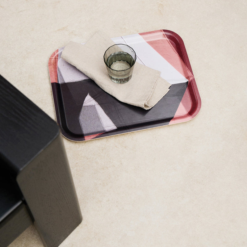 Deconstruct 2052 Tray with glass of water and tea towel from distance.