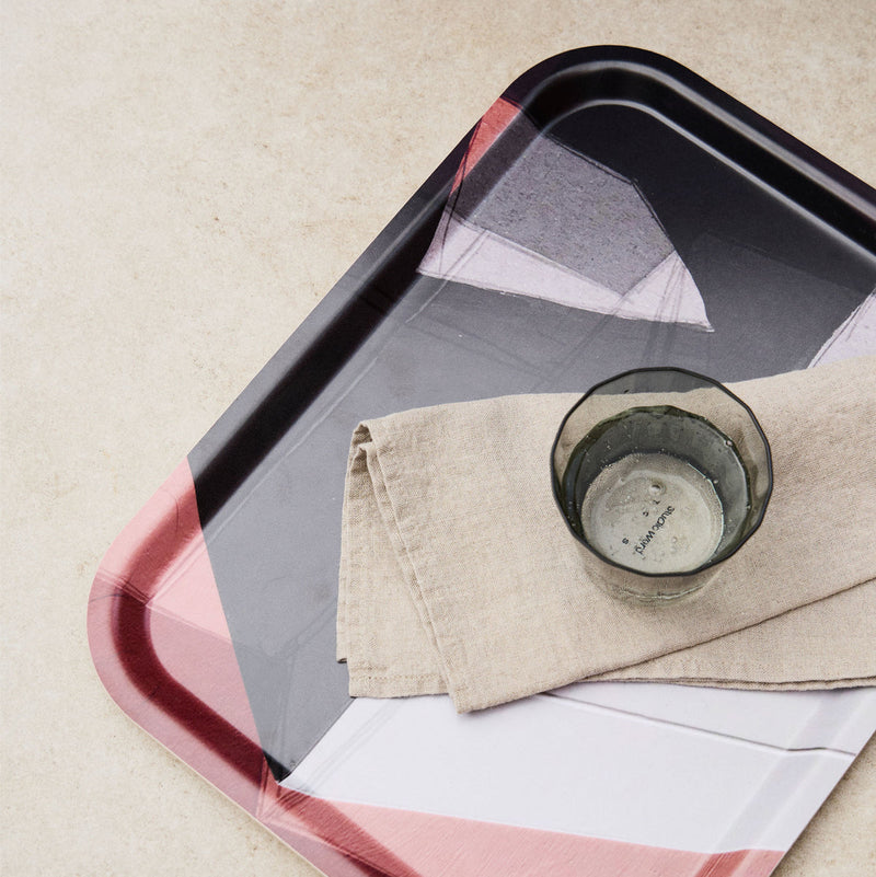 Deconstruct 2052 Tray with glass of water and tea towel.