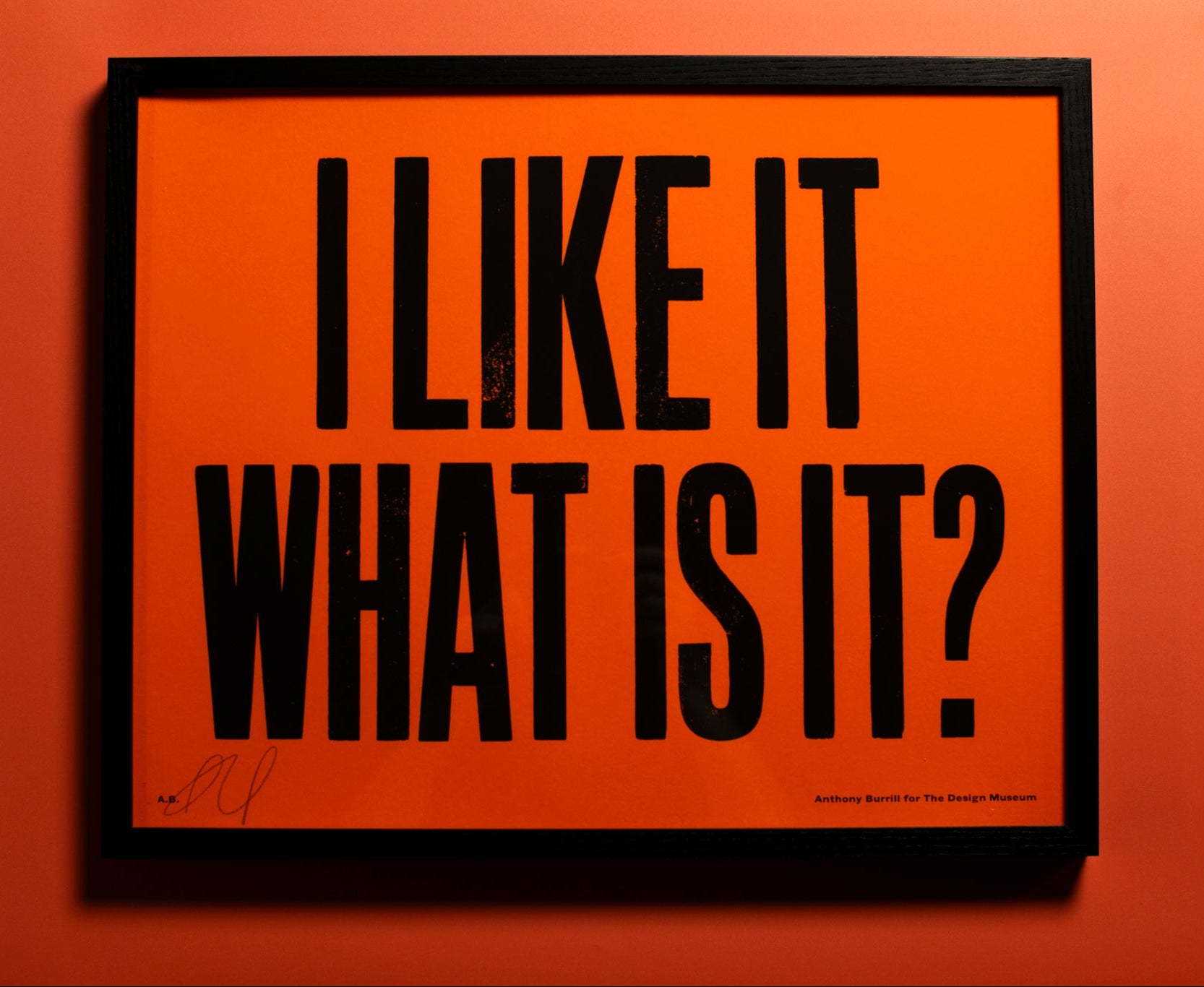 Orange print with black text on an orange background