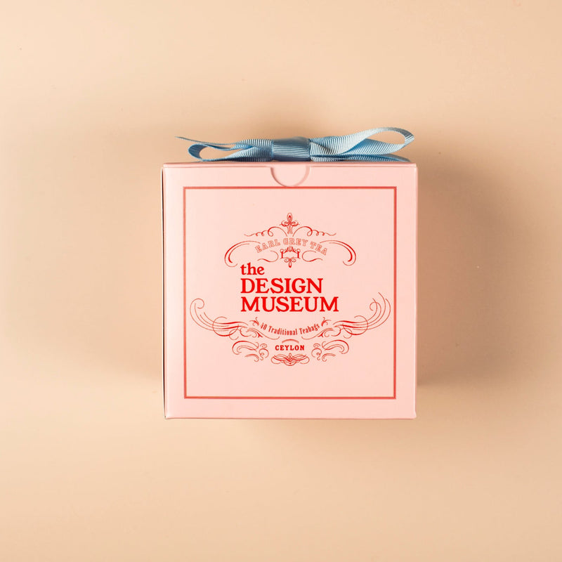 Gift box with 'The Design Museum' branding on a beige background