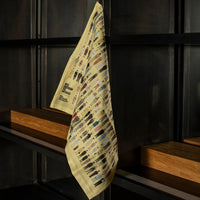 Tea towel hanging up on a mirrored wall