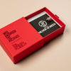 Red box with a black card featuring 'The Design Museum' logo on a beige background