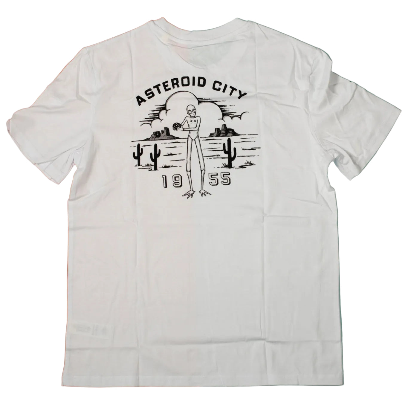White t-shirt with alien graphic and 'Asteroid City 1955' text on a two-tone background