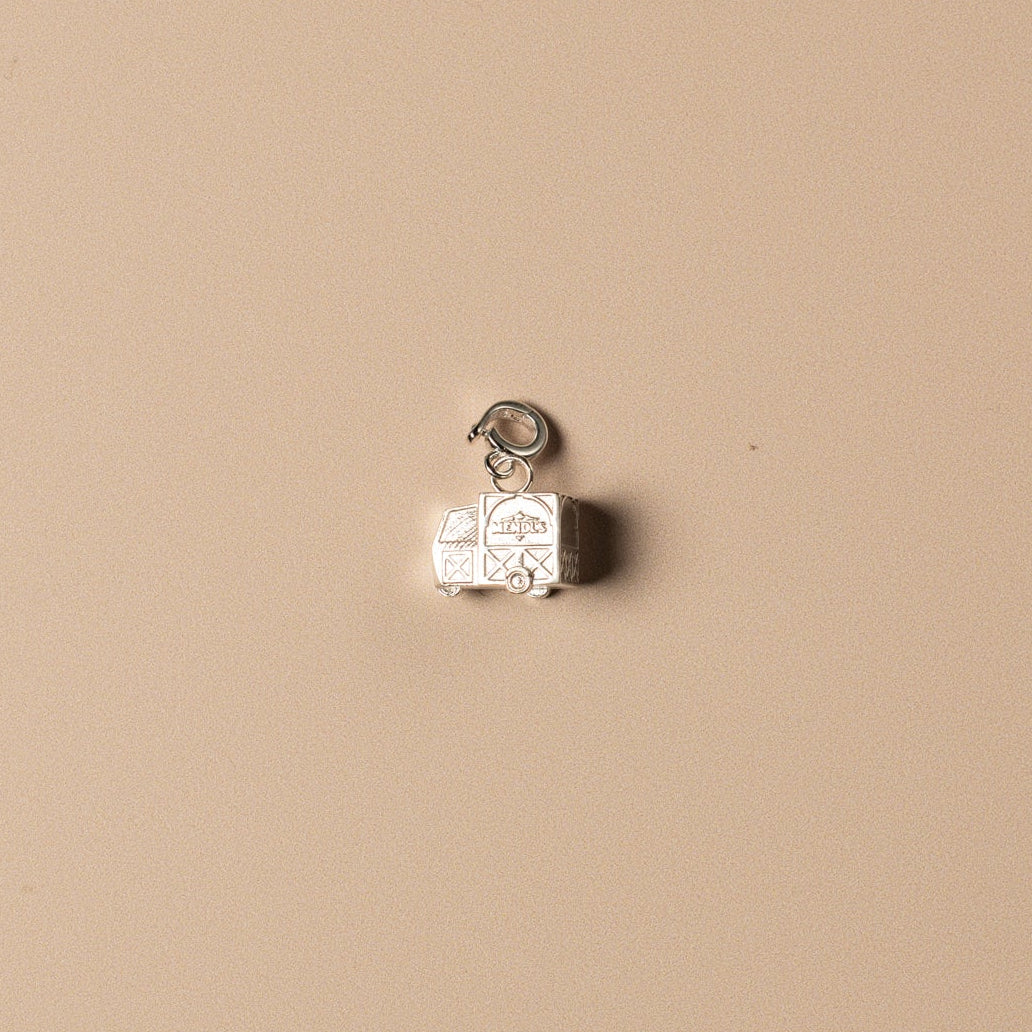 Small decorative item on a beige background