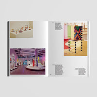 Open page of Design Council book with interior design and gallery images on a white background
