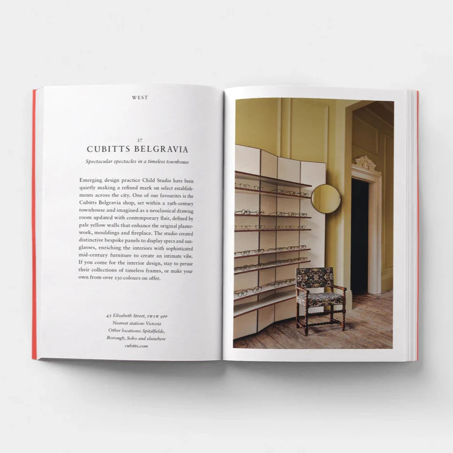 Open page of Design London book featuring a photograph of Cubitts Belgravia with various pairs of glasses on shelves.