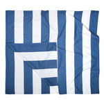 Dock & Bay Towel white and blue stripes foldback to square shape on white background.