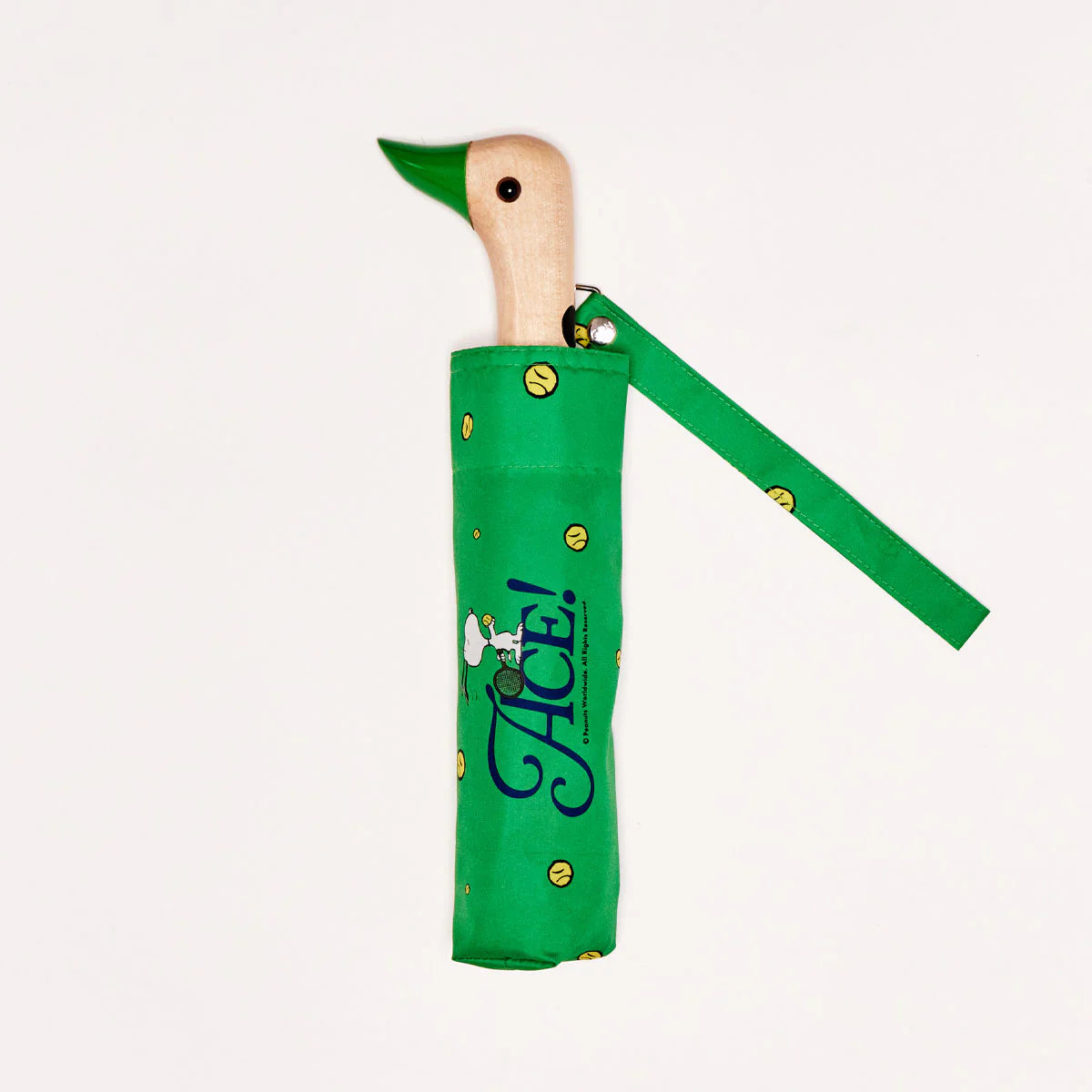 Closed umbrella in a green sleeve with a duck shaped wooden handle
