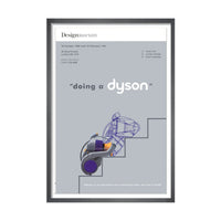 A framed poster featuring a stylized graphic of a Dyson vacuum cleaner and text related to a past exhibition at the Design Museum on a grey background.