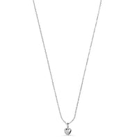 A delicate silver chain necklace with a small, polished heart-shaped pendant, displayed against a solid white background.