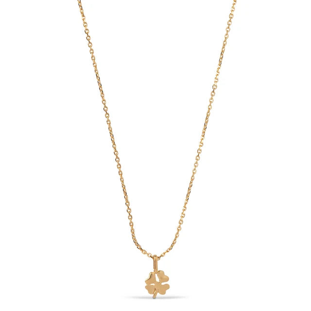 Gold necklace with a clover-shaped pendant on a white background