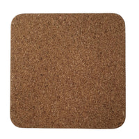 The cork backing of a square coaster on a white background.