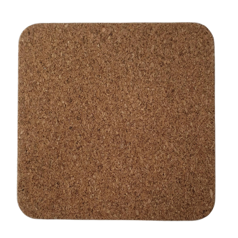 The cork backing of a square coaster on a white background.