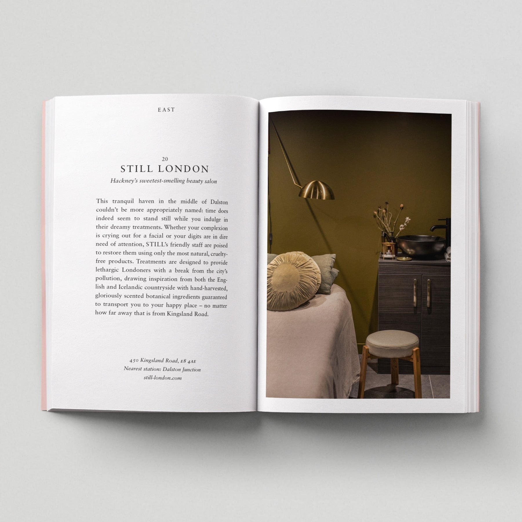 Open page of Eco London book featuring a photograph of Still London beauty salon.