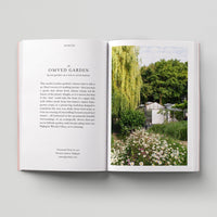 Open page of Eco London book featuring a photograph of Omved Garden.