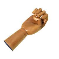 A wooden articulated hand and wrist model, commonly used as a sculptor's or artist's pose holder, shown against a plain white background.