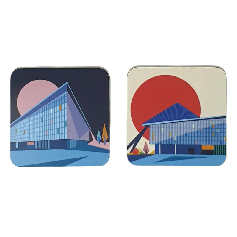 A pair of square coasters with cork backing and a colourful graphic design of the Design Museum