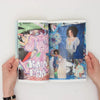 hands holding a fashion zine open