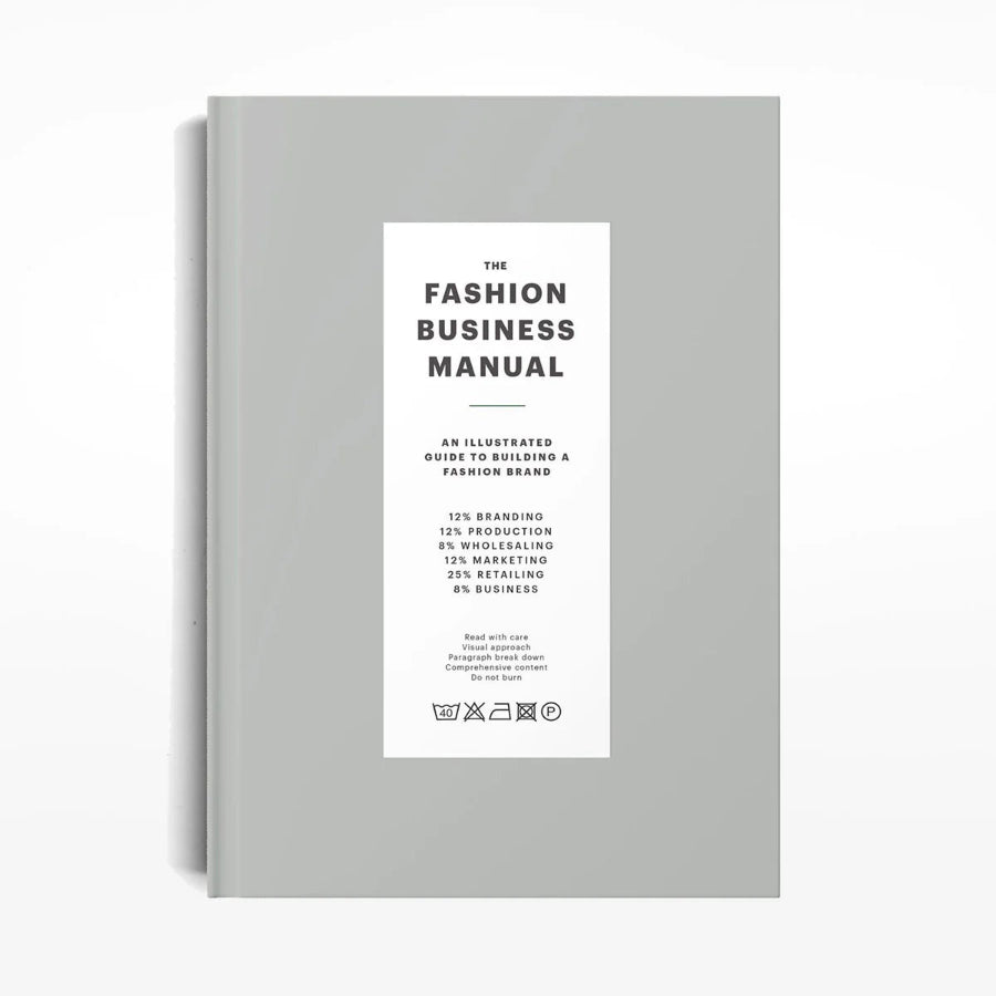 Picture of the Fashion Business Manual book on a white bakground