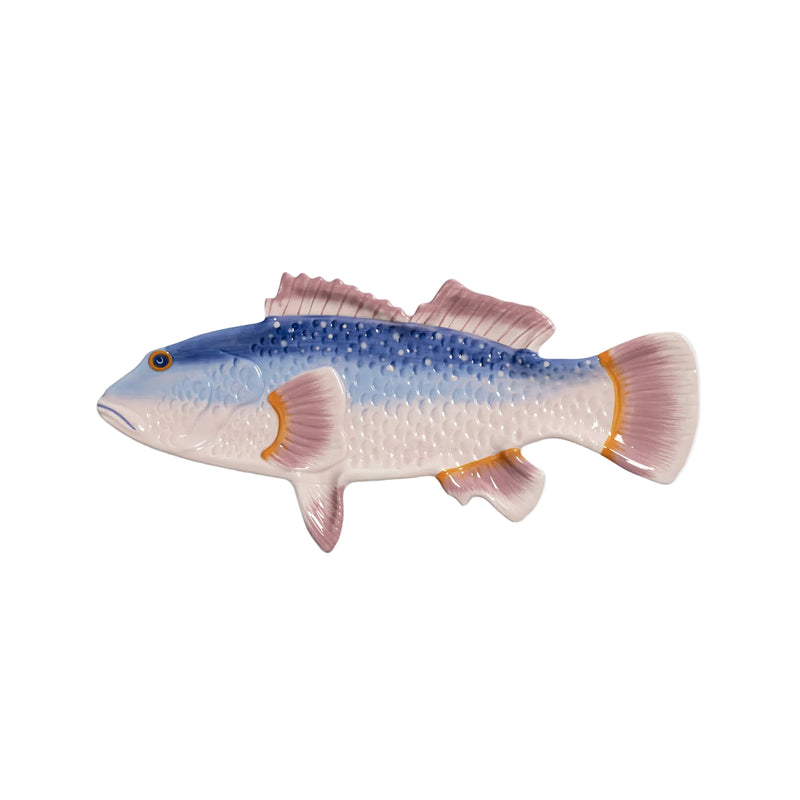 Decorative fish-shaped object with a gradient color pattern on a light gray background
