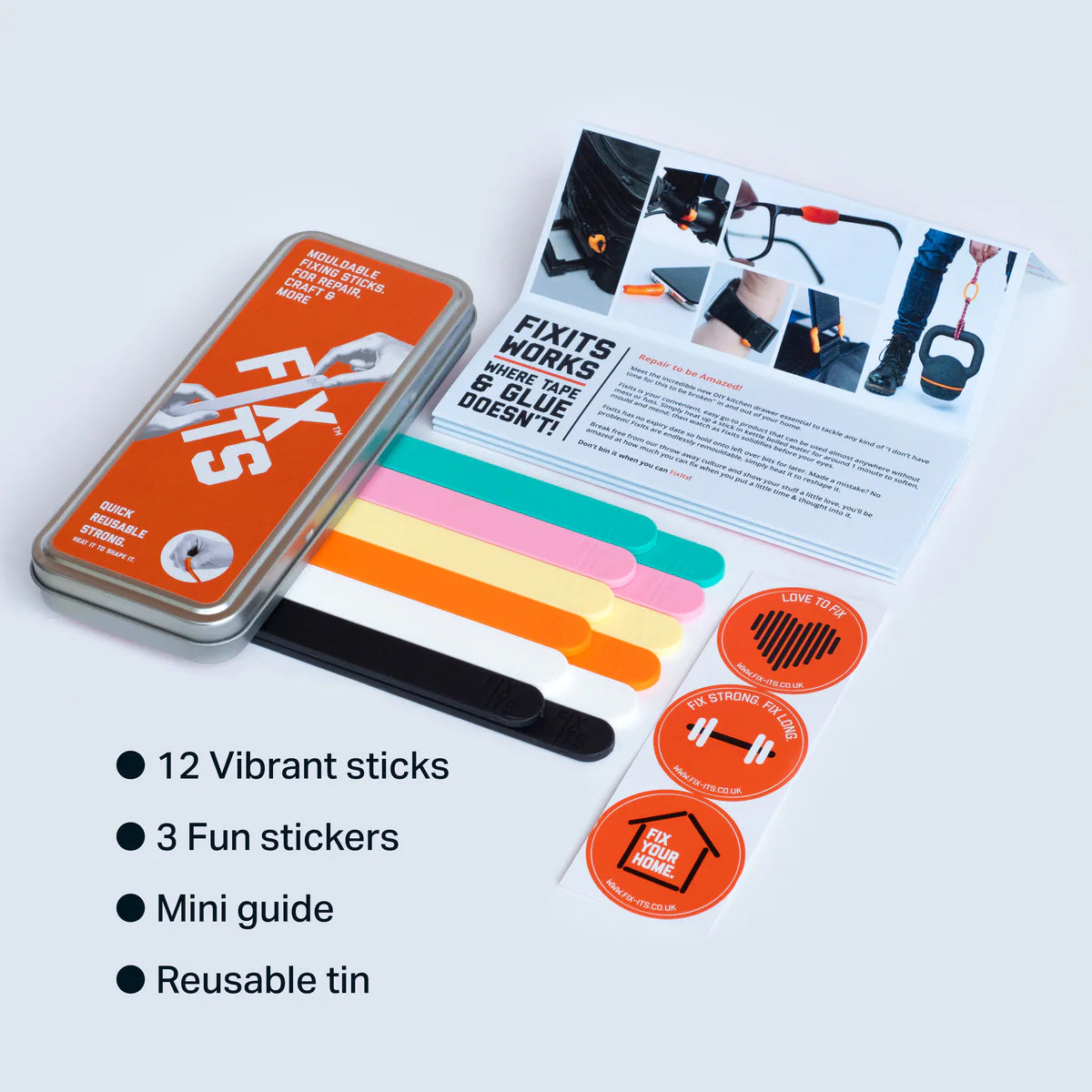 Packaging of FIX ITs product with colorful sticks, stickers, and a mini guide on a light gray background.