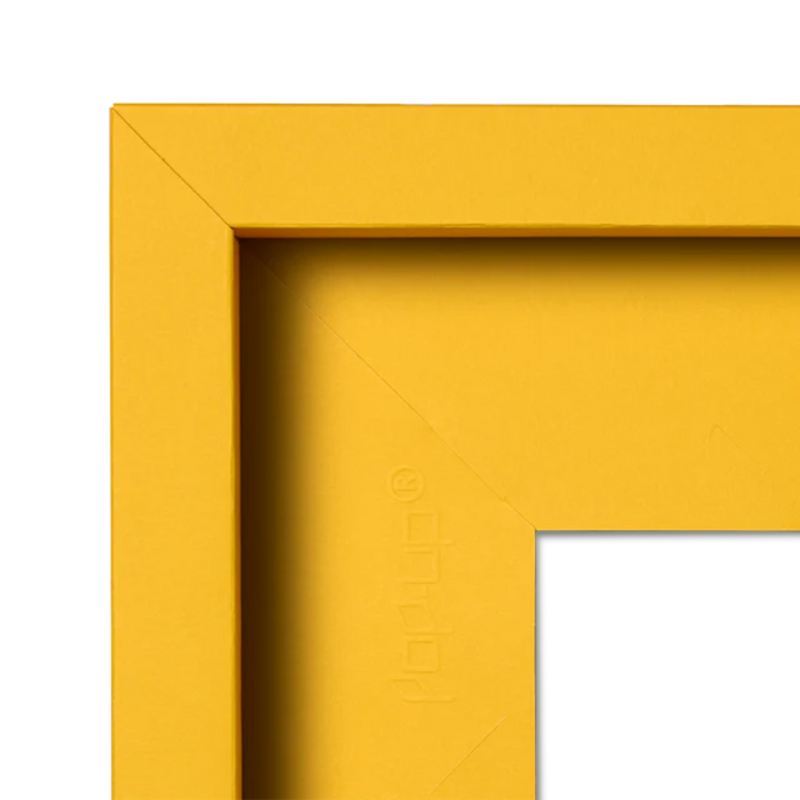 Corner of a yellow picture frame. 