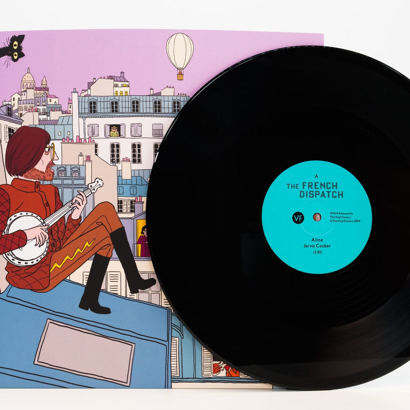 Vinyl record with a blue label featuring an illustration of a person playing a banjo on a rooftop.