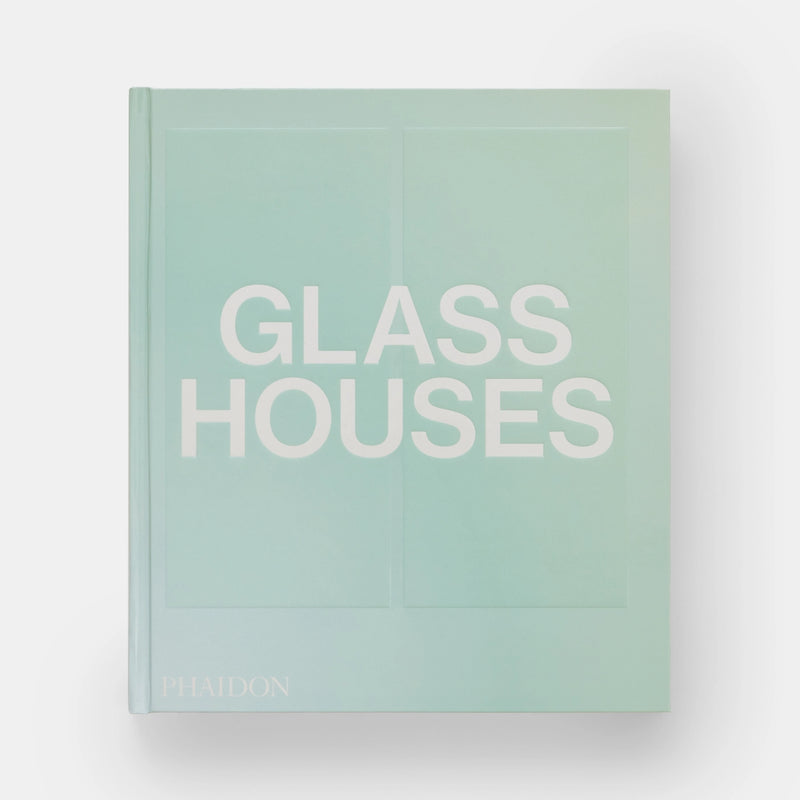 The cover of the book 'Glass Houses' by Phaidon Press, featuring a minimalist design with the title text in white on a light blue background.