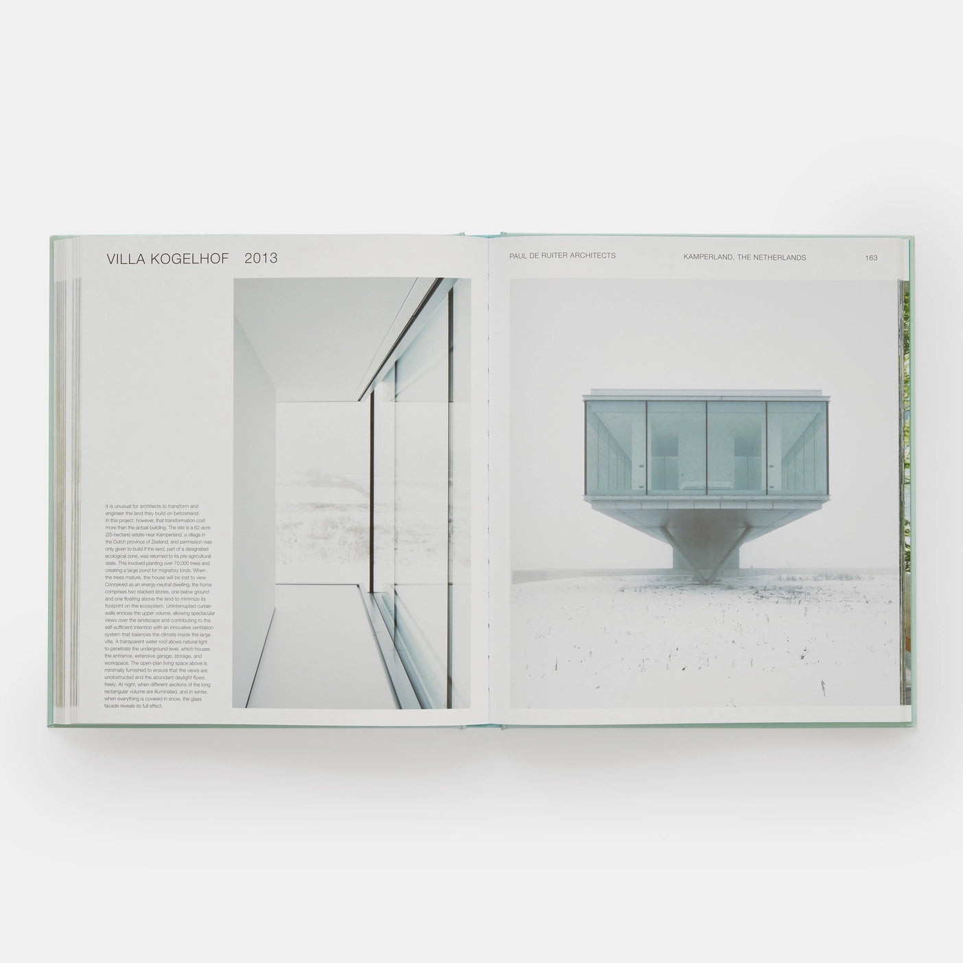 Open page of Glass Houses book featuring a photograph of a floating glass structured house in a snowy landscape.